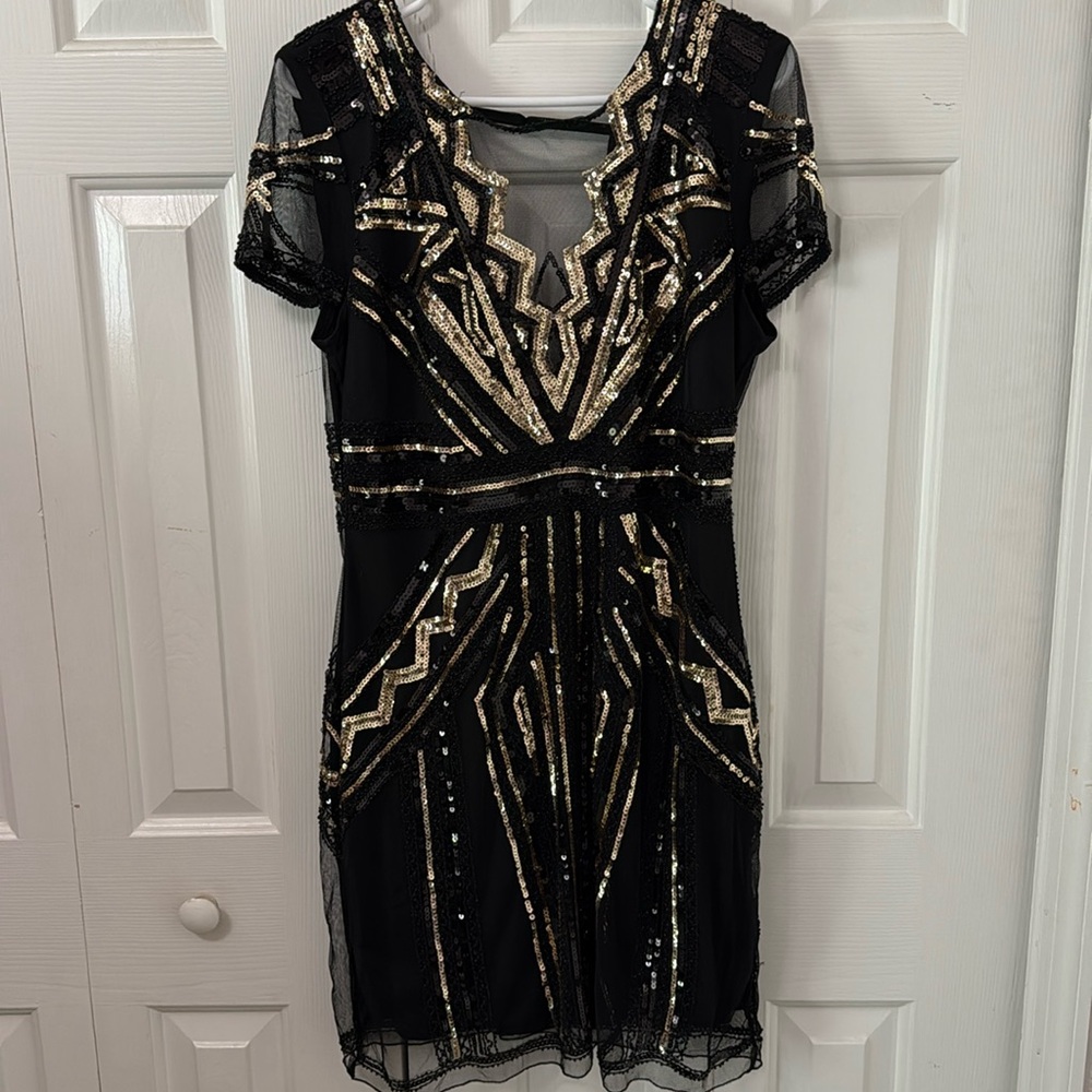 Gold and black sequin dress